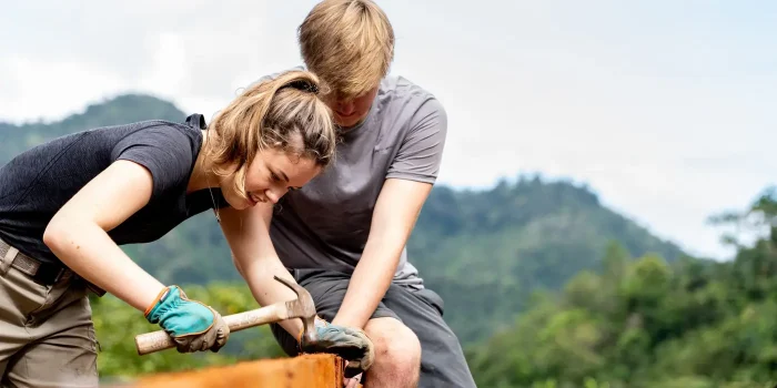 Venturers working on the construction of a cafeteria for a school built by a previous Raleigh team. Once this is complete the goverment will fund school meals for the children in this indigenous community.
